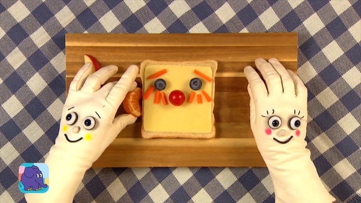Zwei Handschuhe mit Butterbrot 
