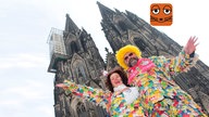 Verkleidetes Paar vorm Kölner Dom