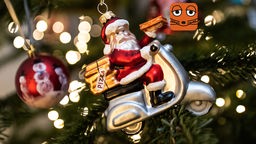 Weihnachtsmann auf Motorrad als Weihnachtsbaumkugel
