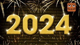 Die Zahl 2024 mit Feuerwerk im Hintergrund