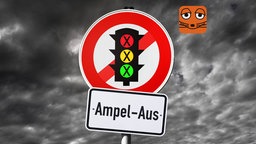 Ein zusammengebautes Verkehrsschild mit einer durchgestrichenen Ampel