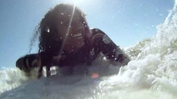 Surfcamp - Iman im Wasser