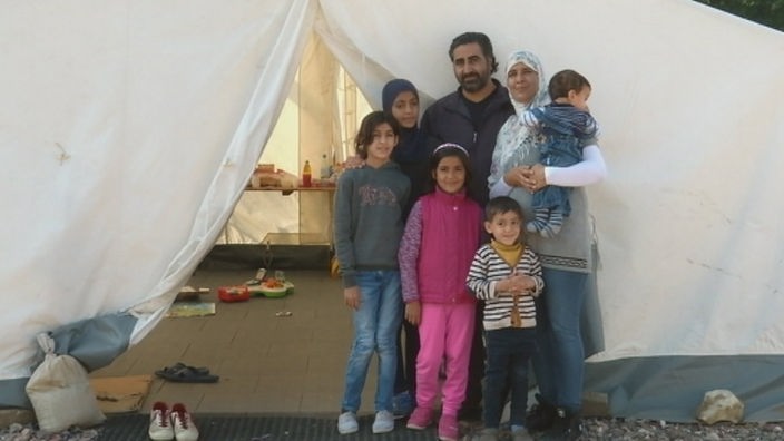 Flüchtlingskind Tiba mit seiner Familie