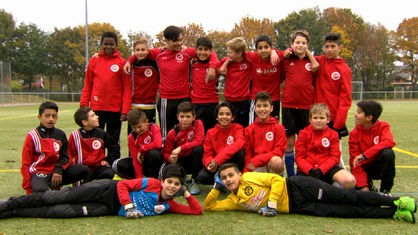 Gruppenfoto von Mohammads Fußballmannschaft.