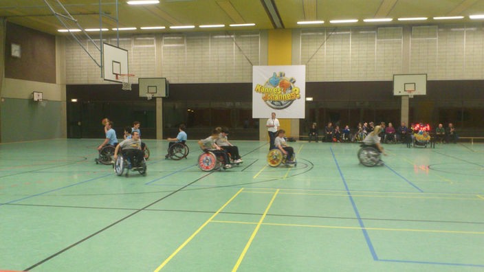 Bilder zur Sportart Rollstuhlbasketball.