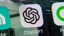 Icon der ChatGPT-App auf einem Handydisplay. 