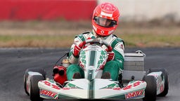 Michael Schumacher mit Sturzhelm in Kart.