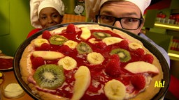 Pizza Meer aus Früchten