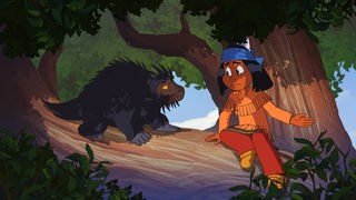 Yakari spricht im Wald mit einem Tier.