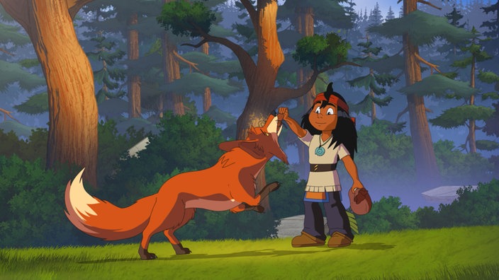 Ein Fuchs wird von einem Indianerjungen gefüttert.